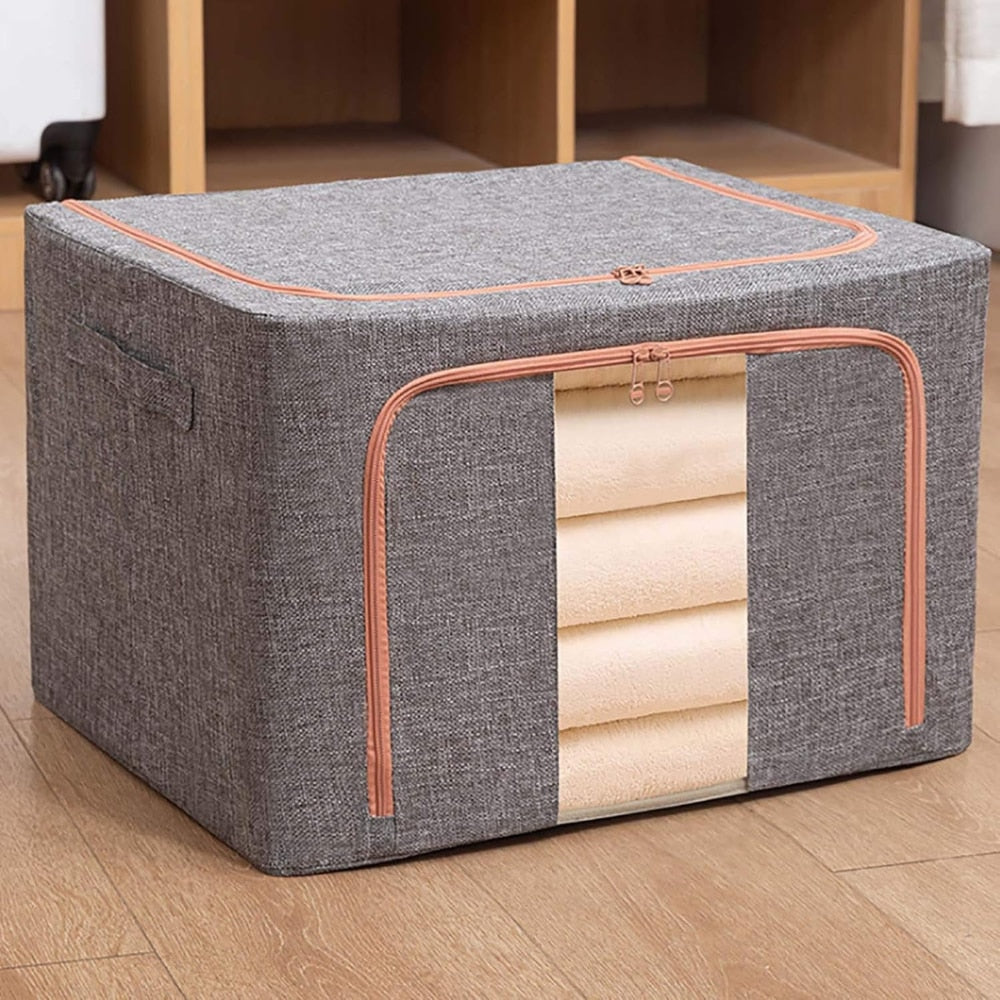 Organizator depozitare 100 litri, cutie textila pliabila cu capac si fermoar, panou transparent pentru vizualizare si cadru metalic robust, ideala pentru haine voluminoase si depozitare
