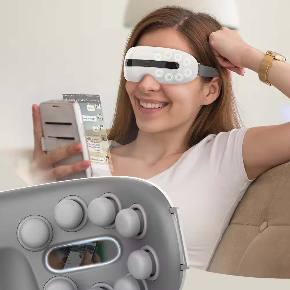 Aparat masaj ochi cu 4 moduri, 16 puncte, Bluetooth, compresie termică, alb